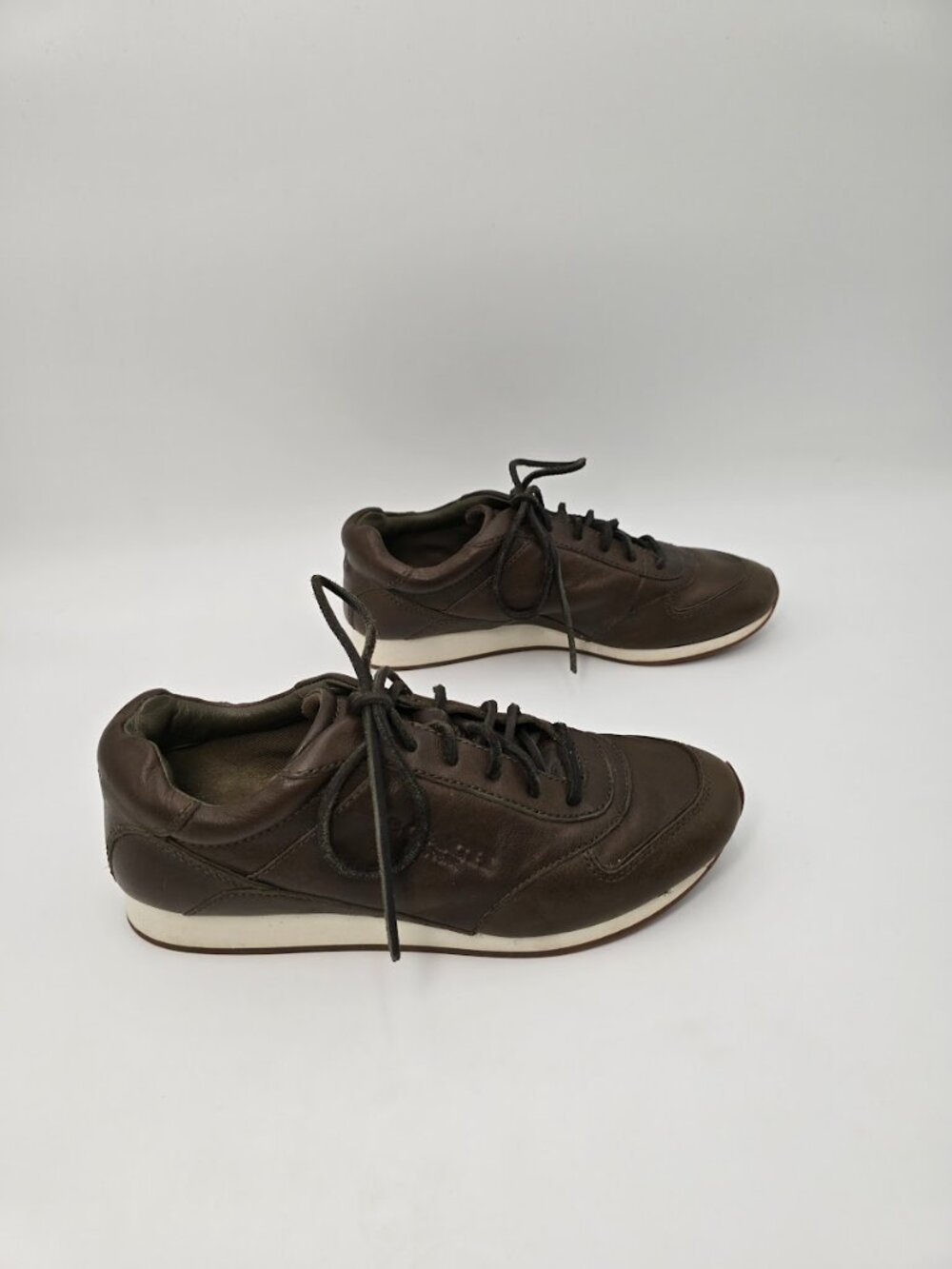 COACH Raeann Leather Sneaker in a dark brown Size 7.5